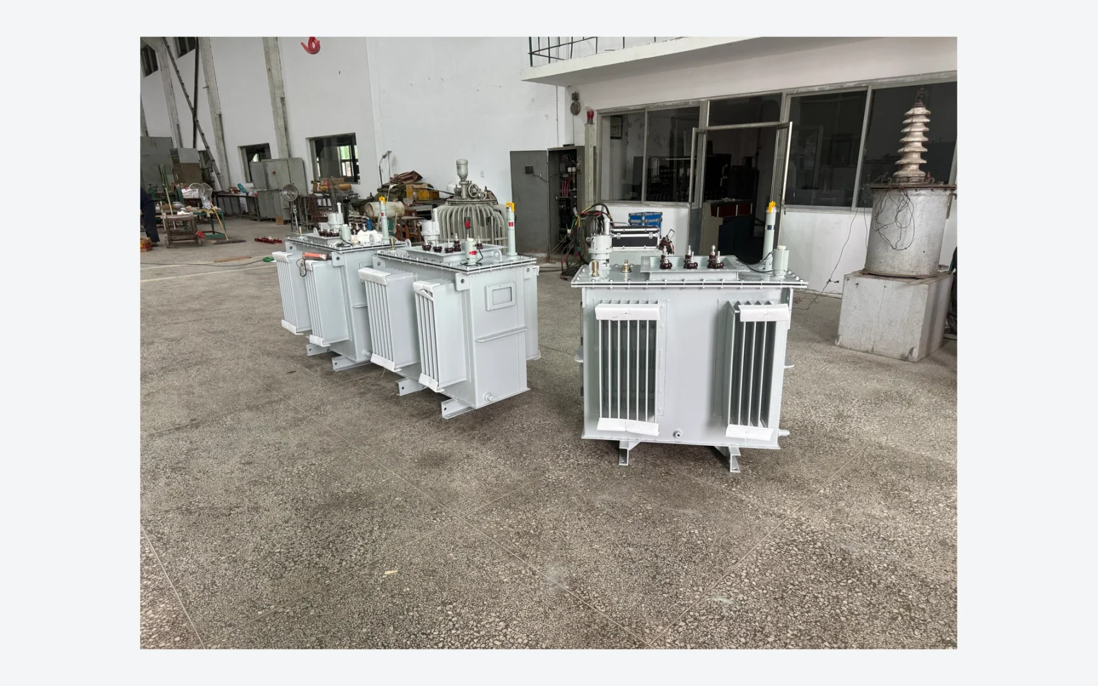 Authentic factory photograph of completed small oil-immersed transformer units
